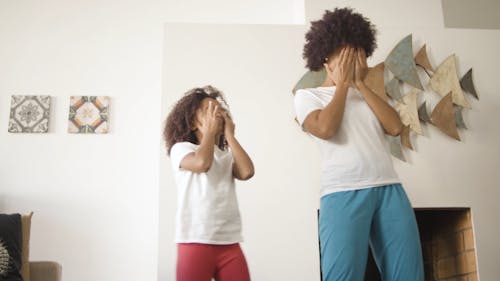 Woman And Little Girl Dancing