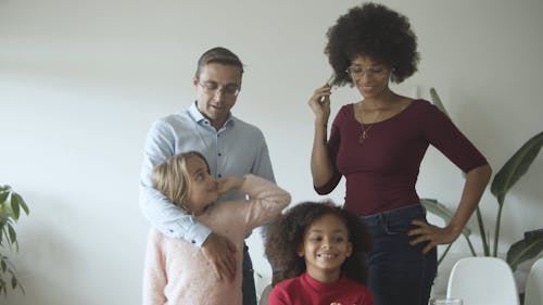 A Little Girl Clapping with her Mom