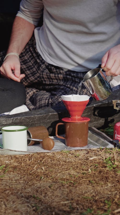 Man Filling Up Water In Coffee Filter