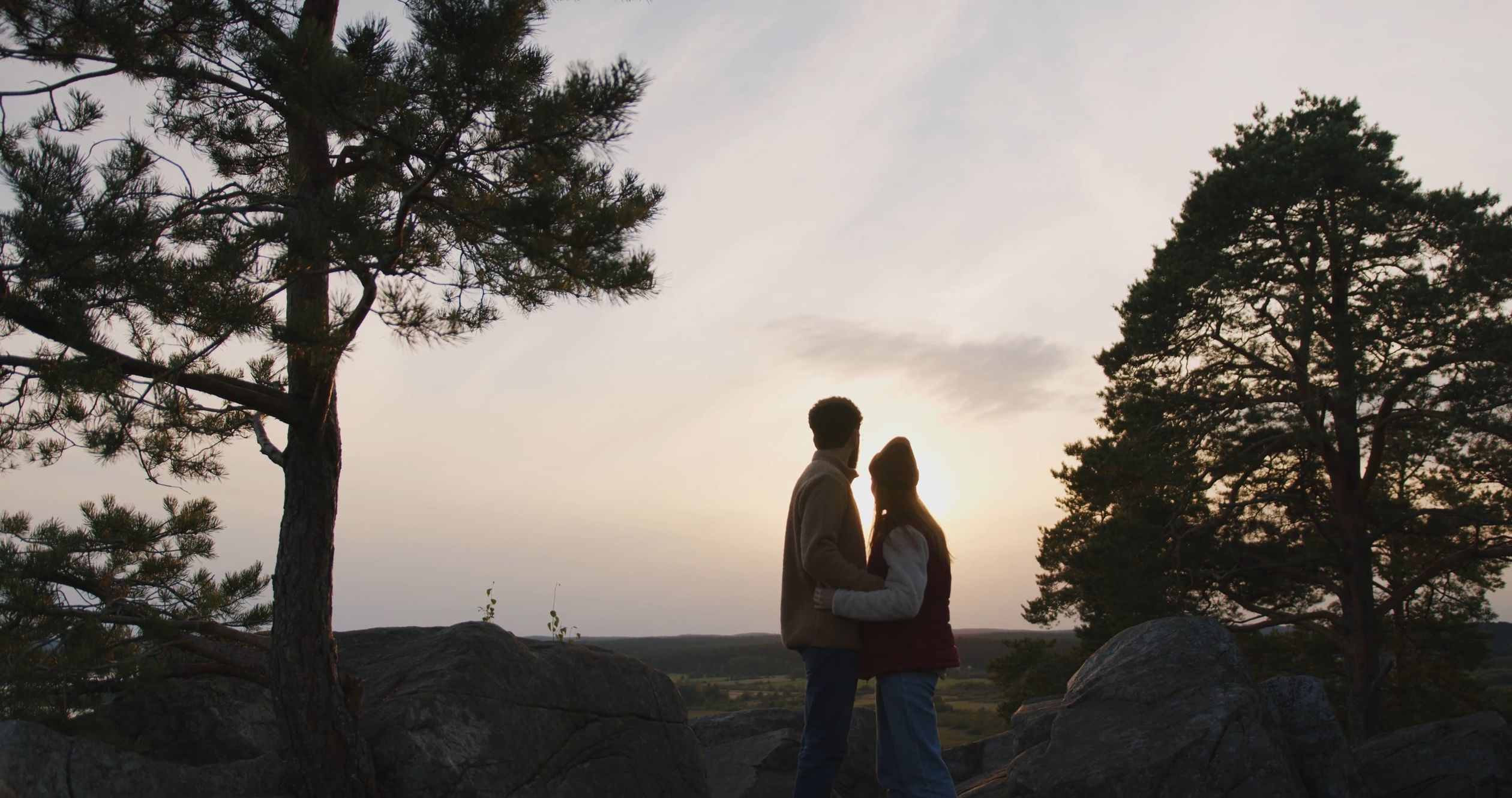A Couple Enjoying Sunset View from a Mountain Cliff Free Stock Video ...
