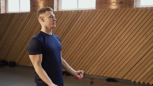 Man Lifting a Dumbbells