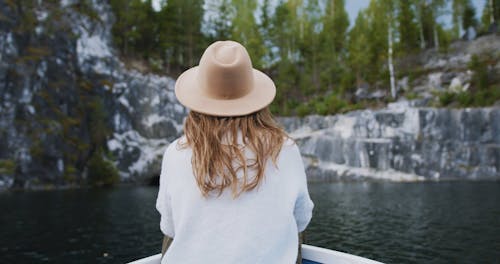 A Woman Riding on a Boat Exploring