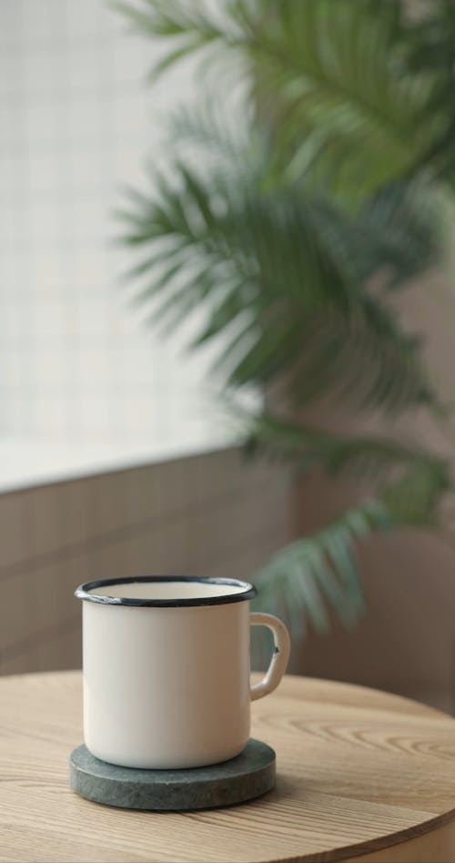 White Cup on a Coffee Table