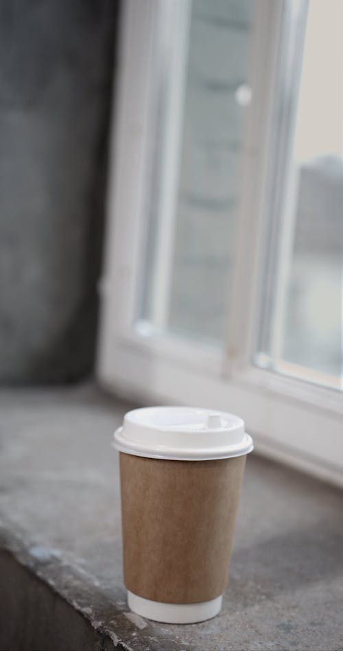 A Coffee Mug at the Window Sill