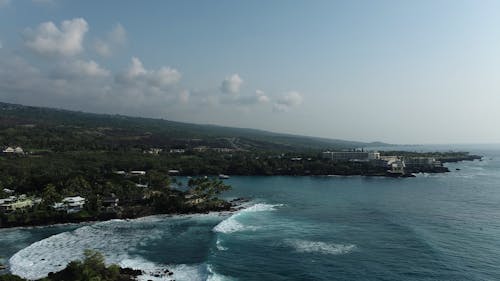 Aerial View of the Ocean Waves in a Beach Resort