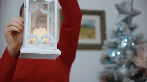 Teenager Lighting Christmas Candle