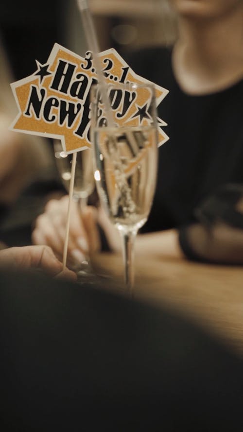 A Person Holding a Champagne Glass