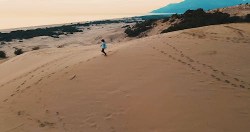 Woman Running in the Desert