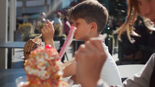 A Boy Eating an Ice Cream