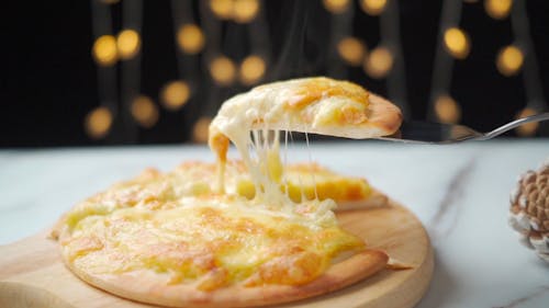 Hot Pizza in a Wooden Pan