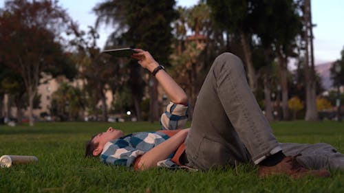 Man on a Park Talking on Phone