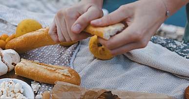 person holding a bread
