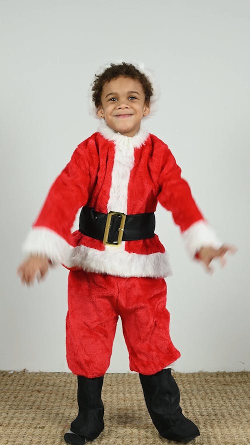 Kid Using a Costume of Santa Claus