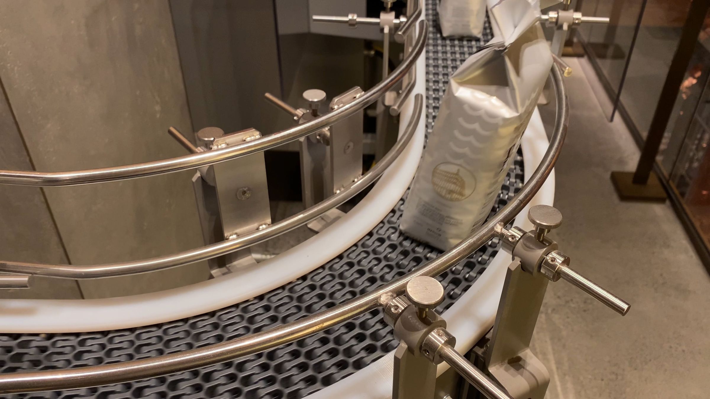 Coffee packaging on industrial conveyor line