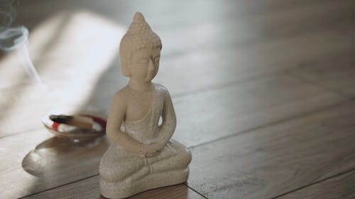 A Buddha Statue Peacefully Meditating
