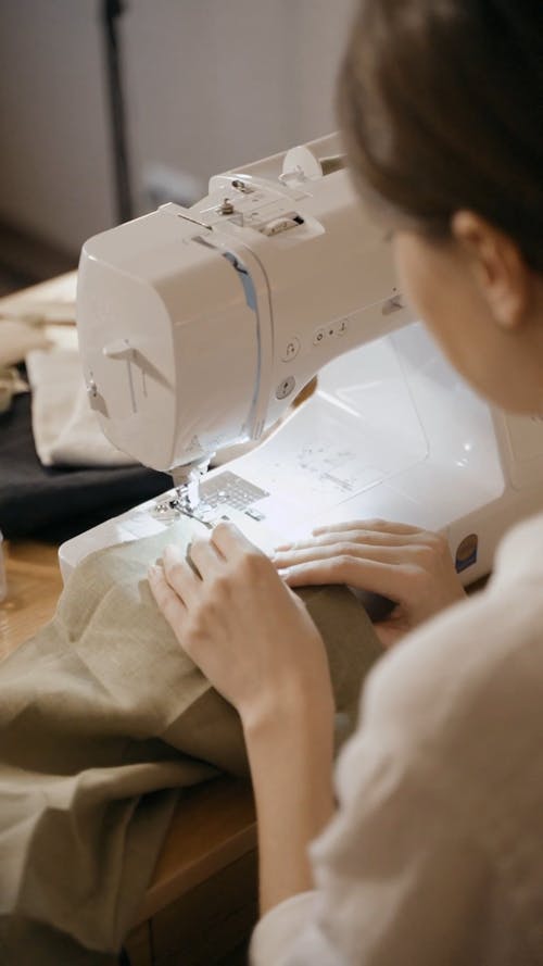 Woman Working With Sewing Machine