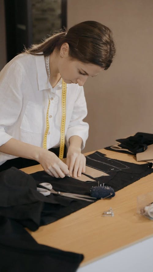 Tailor Marking Black Fabric With Chalk