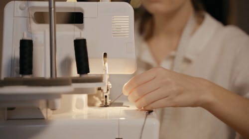 Woman Using Sewing Machine