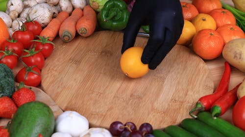 Person Cutting Lemon