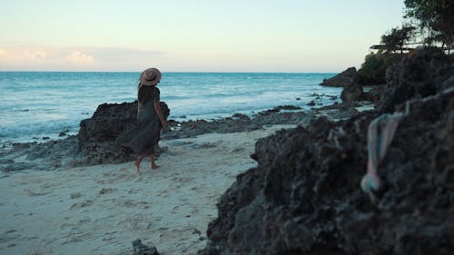 Woman Walking In Sand Beach 