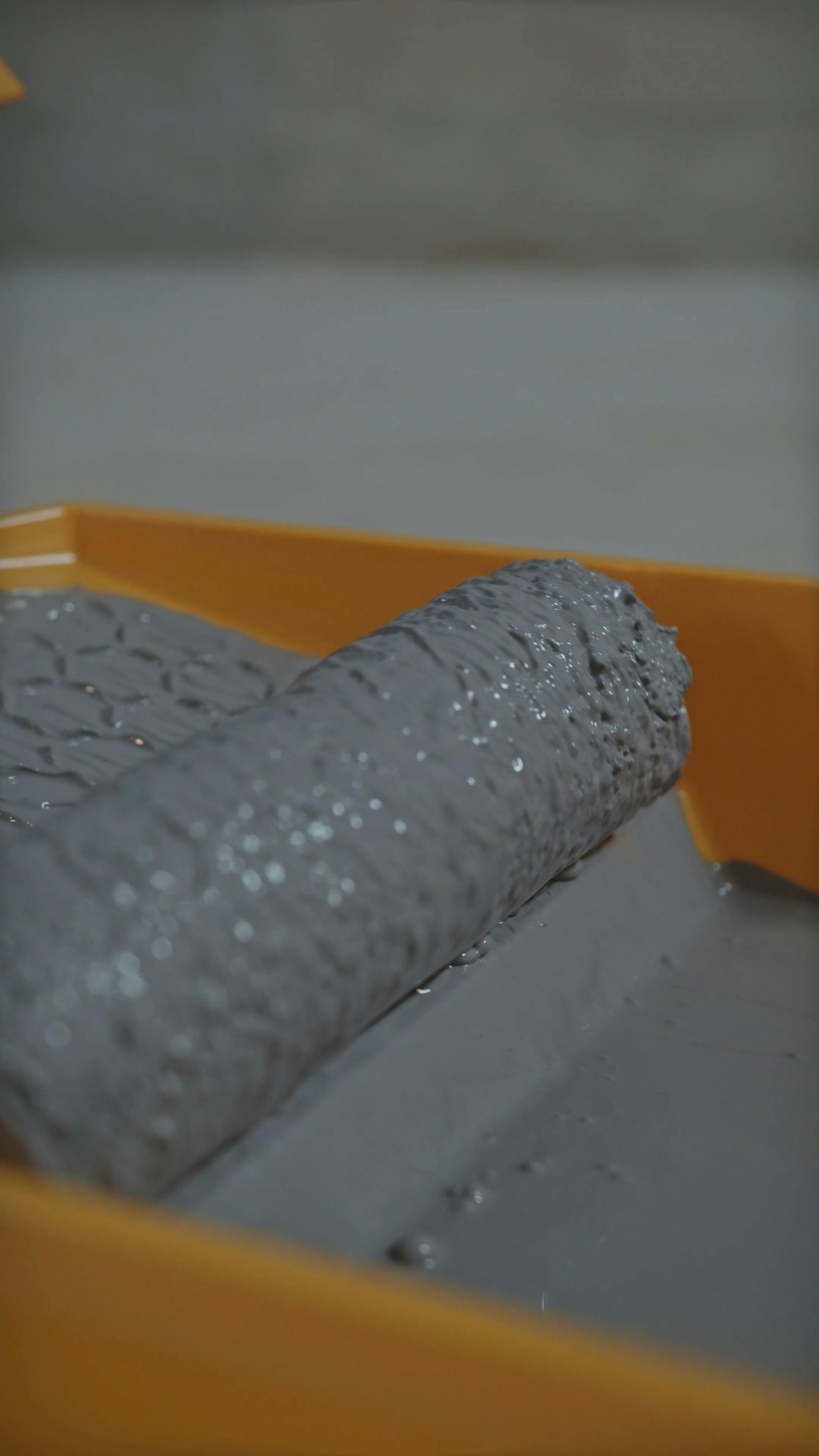 Removing Excess Paint from Paint Roller · Free Stock Video