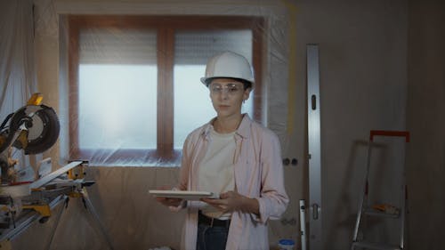 Woman Holding Digital Tablet