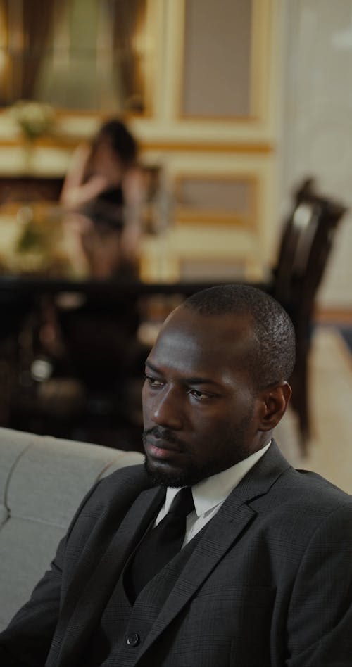 Man In Suit Calling On Mobile Phone