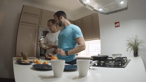 Couple Cooking Breakfast