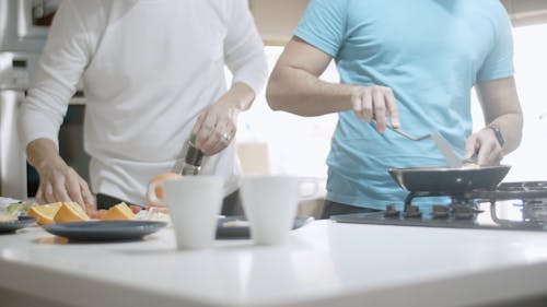 Couple Cooking Breakfast