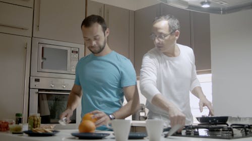 Couple Cooking Breakfast