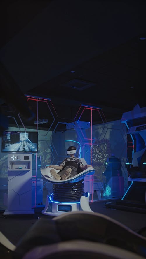 Person Playing Virtual Reality Simulator