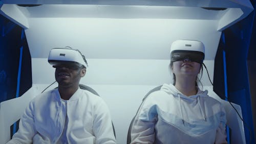 A Man and Woman Wearing Virtual Reality Headset