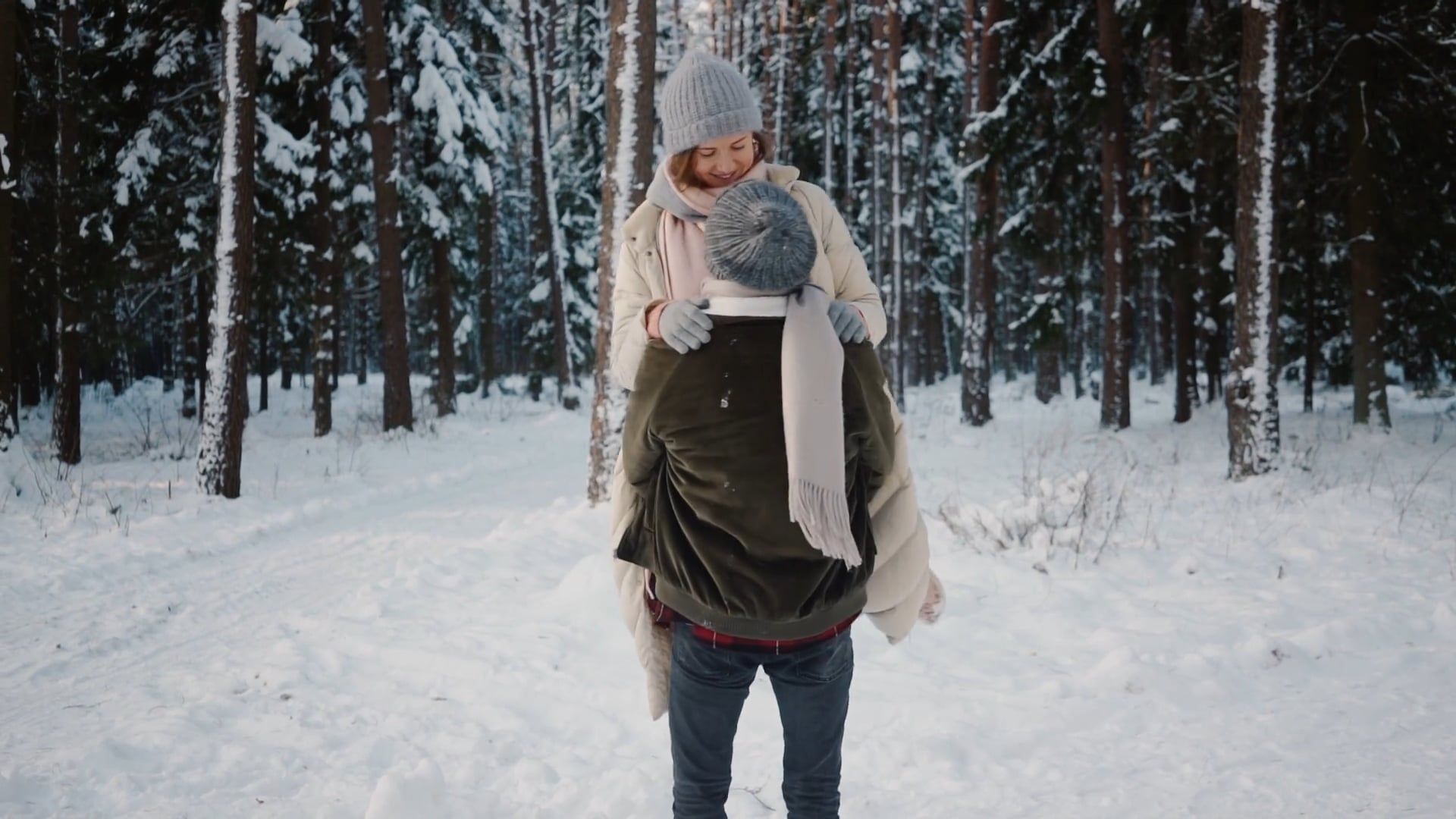 A couple in winter clothes hugging in the snow Free Stock Video Footage ...