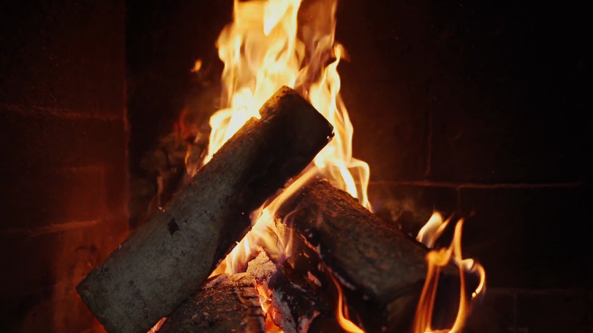A fire is burning in a fireplace with logs Free Stock Video Footage ...