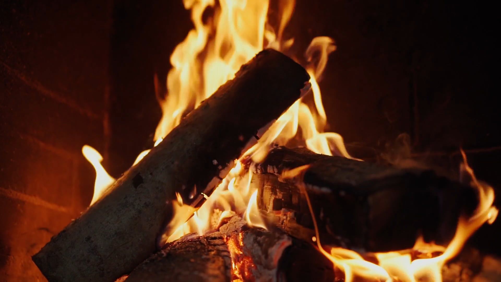 A fire is burning in a fireplace with logs Free Stock Video Footage ...