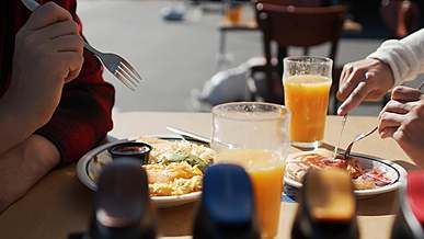 couple having breakfast outdoors