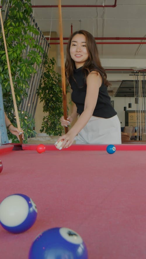 Women Playing Billiard