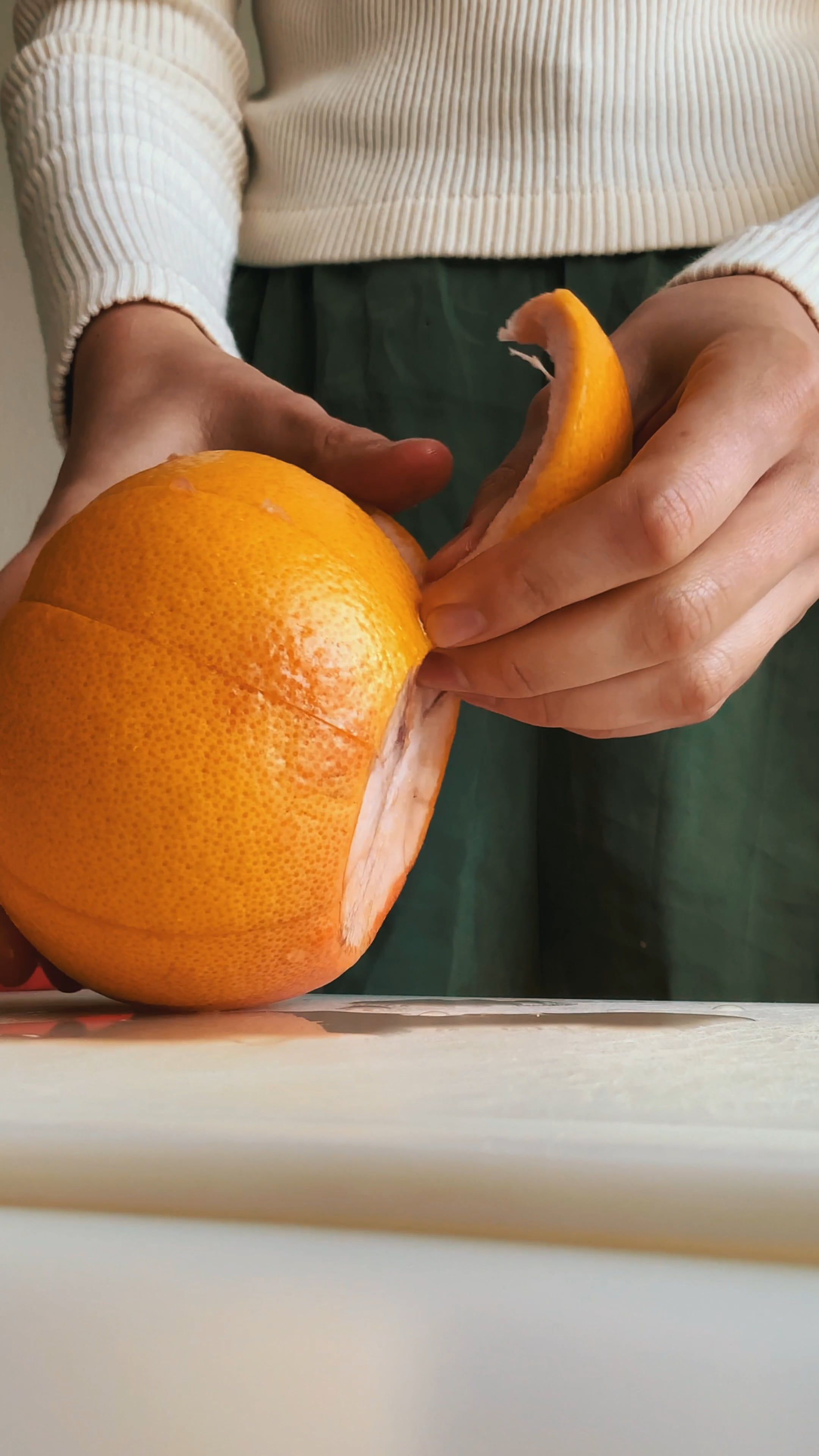A Person is Peeling the Orange Using Her Hands · Free Stock Video
