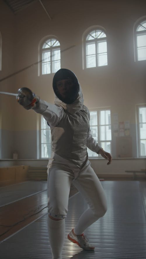 A Fencer Dueling with an Opponent