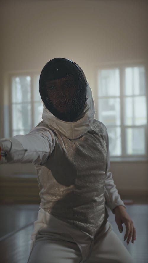 A Fencer Sparring with a Partner