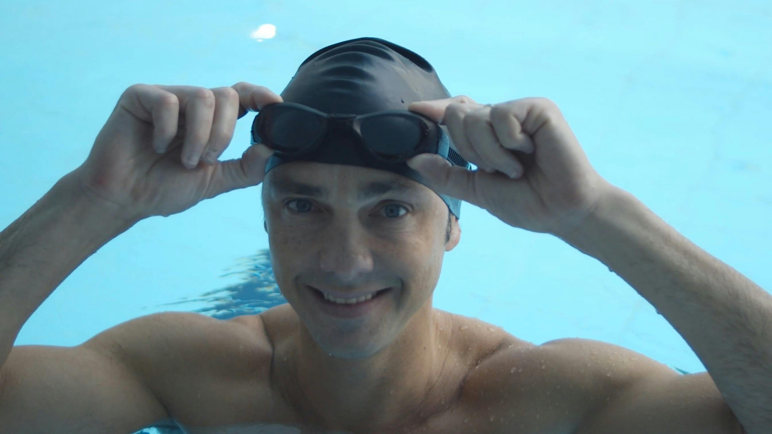 Swimmer with Goggles in a Swimming Pool · Free Stock Video