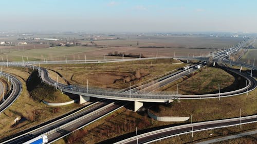 Aerial Shot of Cars Passing by the Road