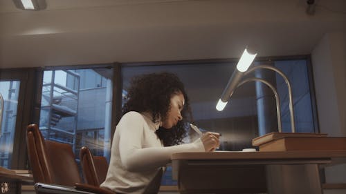 College Students Researching and Studying at the Library