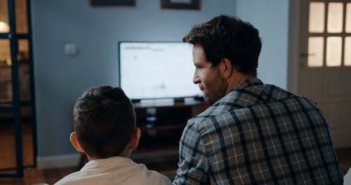 A Father and Son Playing Video Game