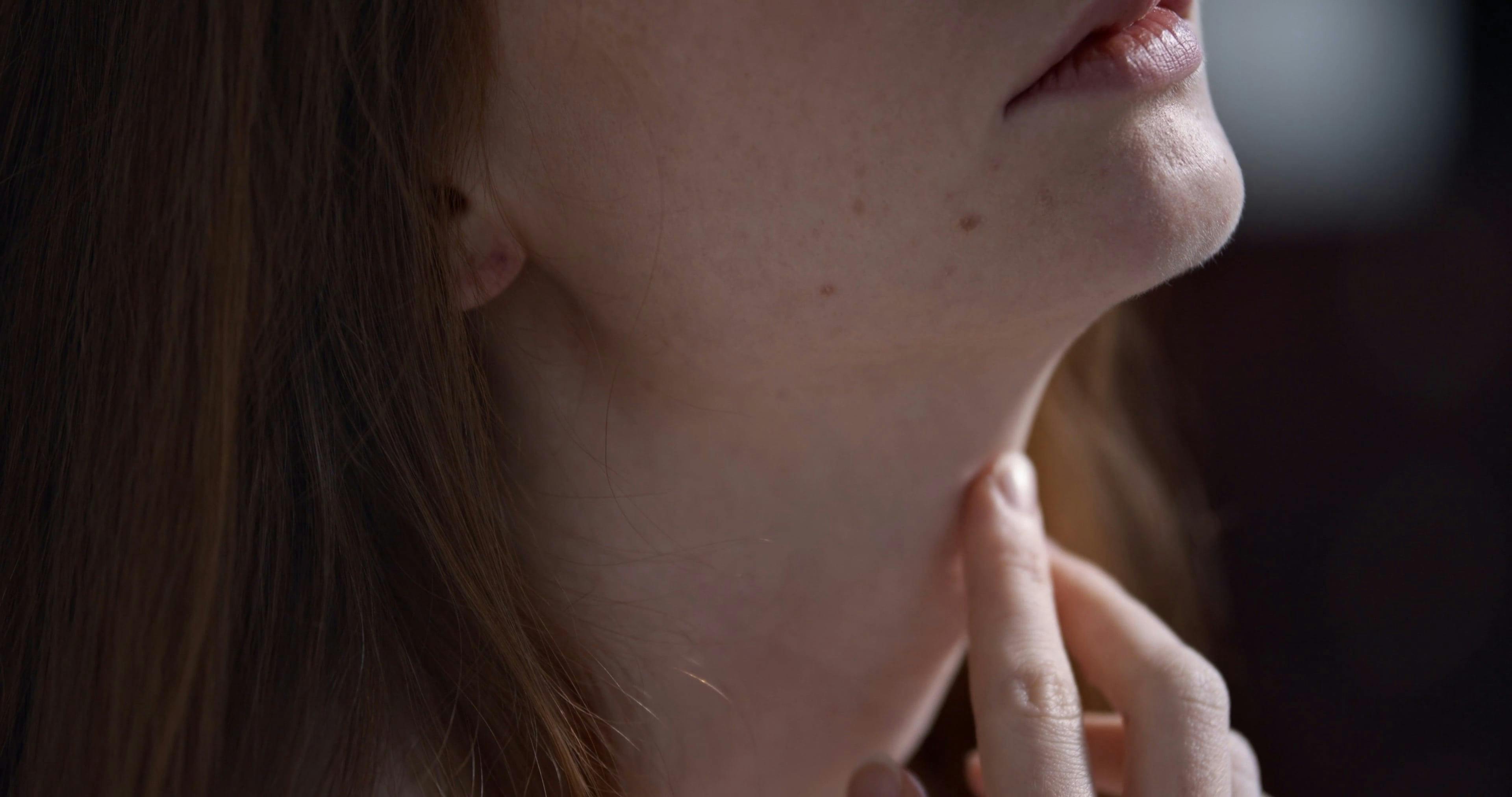 A Woman Caresses Her Neck Free Stock Video Footage, Royalty-Free 4K & HD  Video Clip