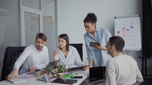 Colleagues Discussing in the Meeting Room