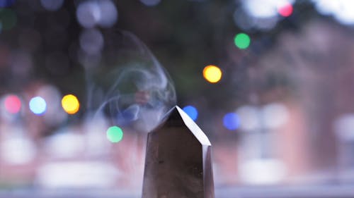 A Close-Up Video of a Crystal with Smoke 
