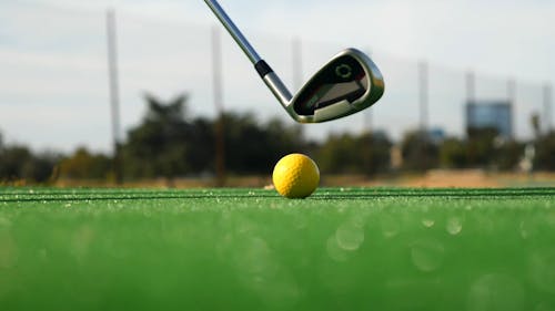 A Person Hitting a Golf Ball