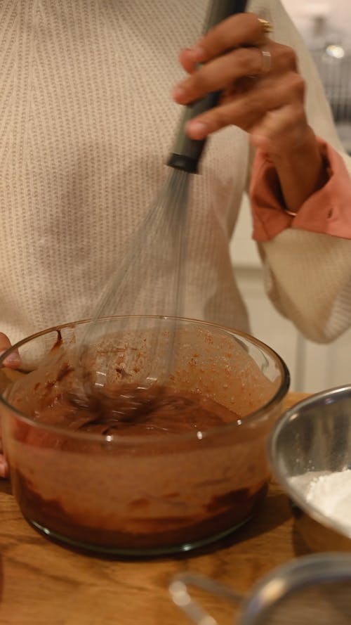 Person Mixing the Melted Chocolate