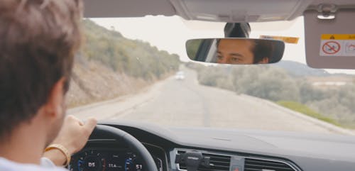 Man Driving a Car